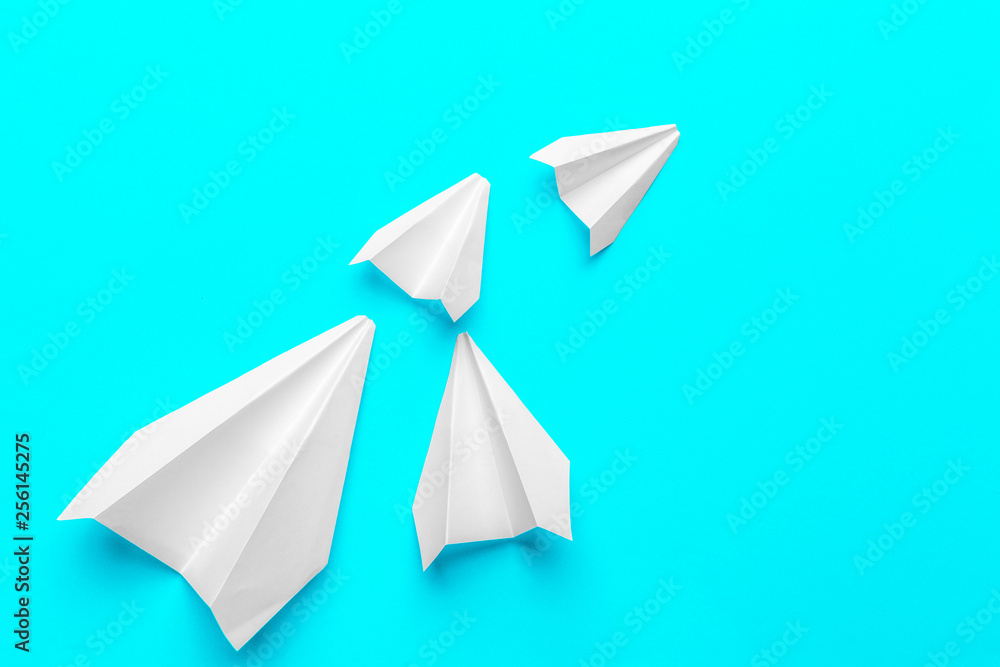 Group of paper planes on blue background. Business for new ideas creativity and innovative solution concepts Group of paper planes on blue background. Business for new ideas creativity and innovative solution concepts