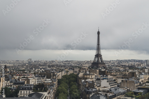 Eiffel Tower over buildings of Paris, France, viewed from Arc de Triomphe © Mark Zhu