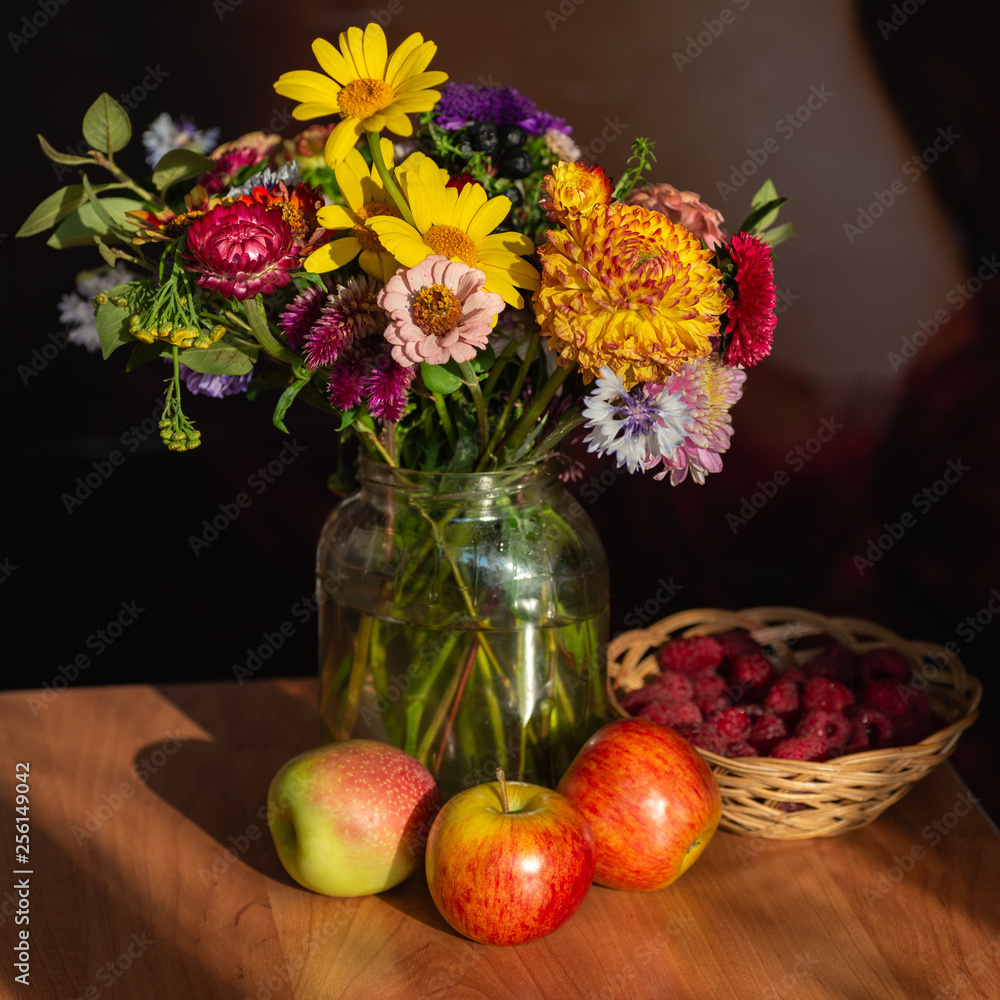 autumn still life with apples and flowers
