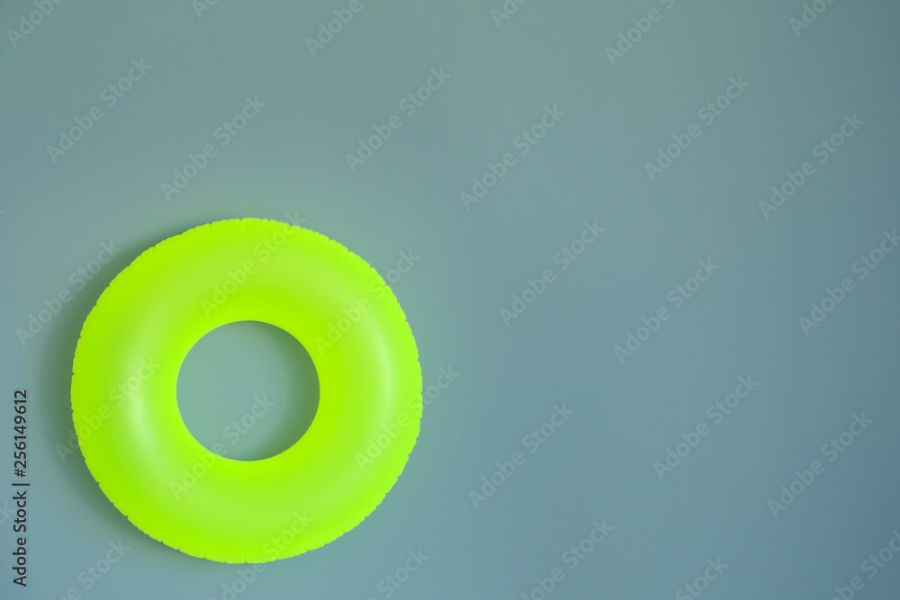 Bright inflatable ring on color background Bright inflatable ring on color background