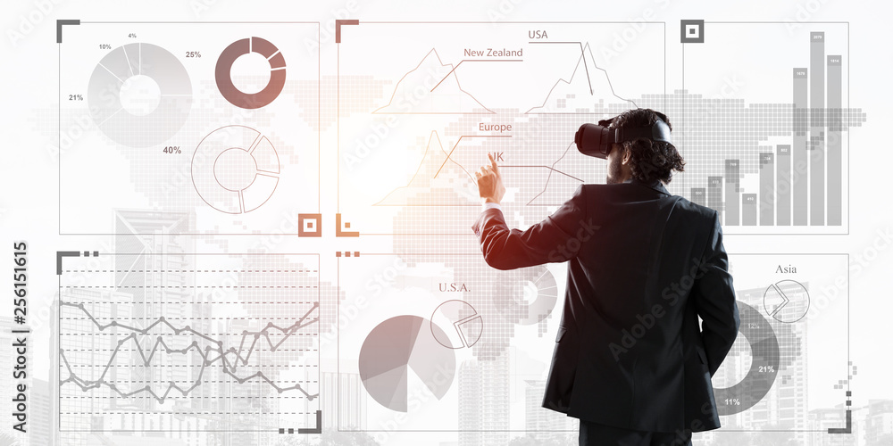 Experiencing virtual reality as new concept in technologies for business. Mixed media Experiencing virtual reality as new concept in technologies for business. Mixed media
