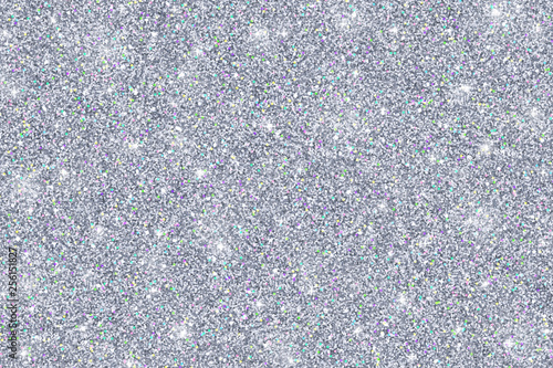 Silver glitter texture with colored particles. Vector