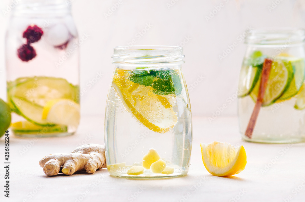 Bottle with detox water with lemon, ginger and mint Bottle with detox water with lemon, ginger and mint