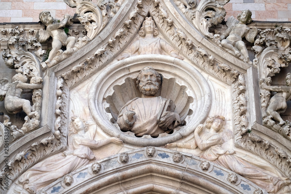 Saint Mark the Evangelist, detail of the Doge Palace, St. Mark Square, Venice, Italy, UNESCO World Heritage Sites.