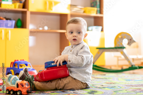 Cute little child plays wit...