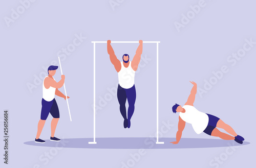 young men practicing gymnasia in bars