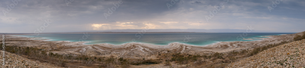 Beautiful green white salty coastline of Dead sea in Jordan