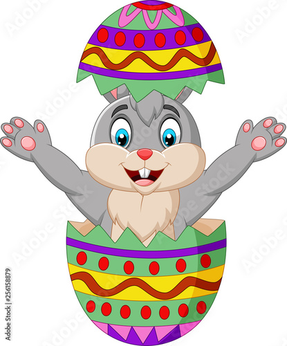 Cartoon bunny come out from an Easter egg