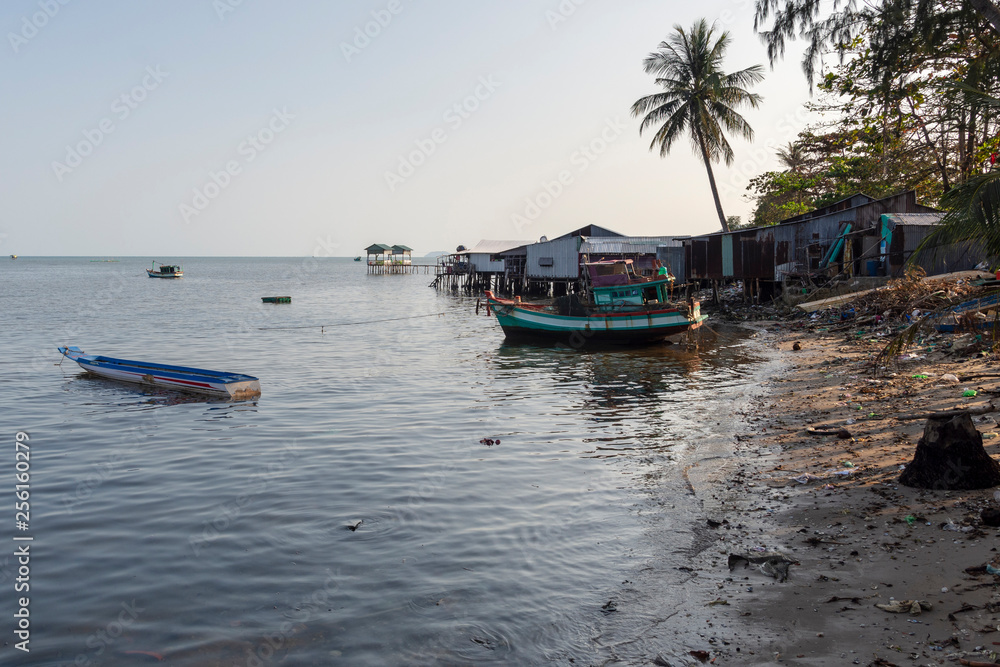 Boathouses and pollution on beach in Phu Quoc Island, Vietnam. Boathouses and pollution on beach in Phu Quoc Island, Vietnam.