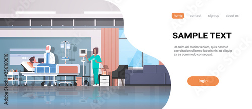 doctor and nurse visiting patient man lying bed with dropper intensive therapy ward healthcare concept hospital room interior modern medical clinic horizontal full length copy space