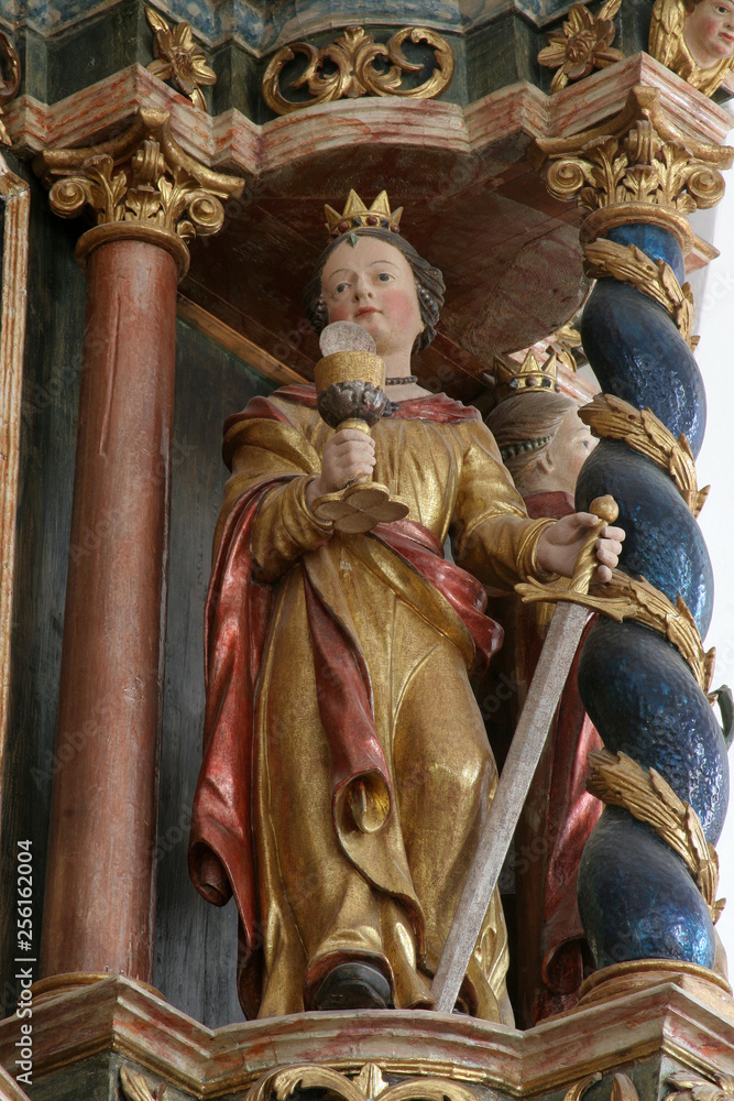 Fototapeta premium Saint Barbara, statue on the altar of Saints Cyril and Methodius in Church of Birth of Virgin Mary in Svetice, Croatia