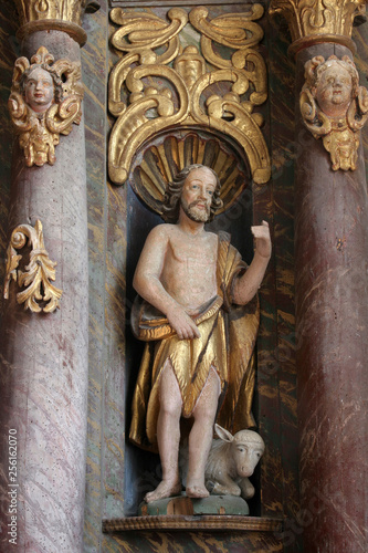 Saint John the Baptist, statue on the altar of Saint Anthony of Padua in Church of Birth of Virgin Mary in Svetice, Croatia  photo