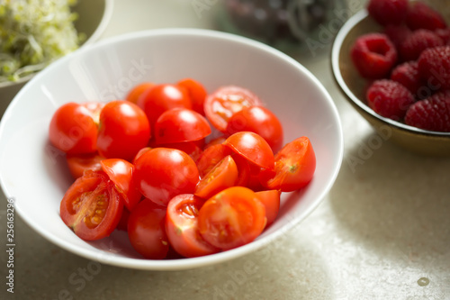 Cherry tomatoes in bowl, salad ingredients 
