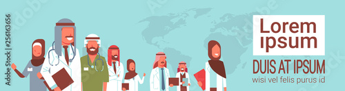 group of arabic doctors team standing together meeting conference concept arab medical hospital workers over world map background copy space portrait horizontal