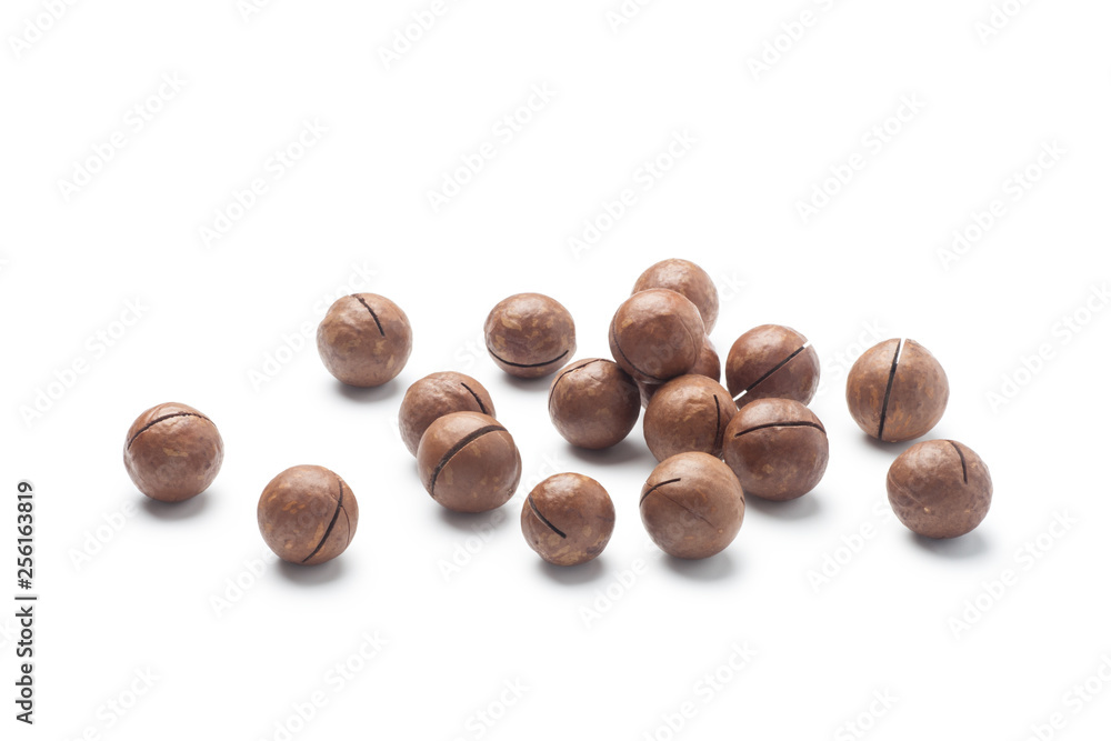 Pile of macadamia nuts isolated on white background Pile of macadamia nuts isolated on white background