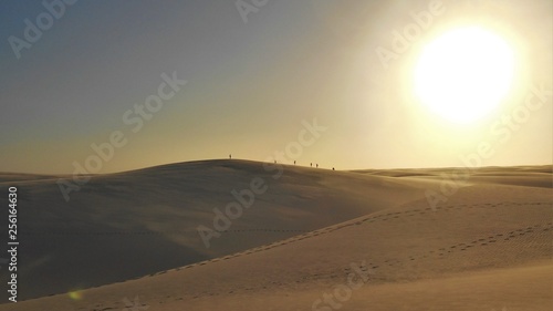 Dunes of Sand and Rainwater Pools at Dusk in Len    is Maranhenses National Park looks like a Martian landscape