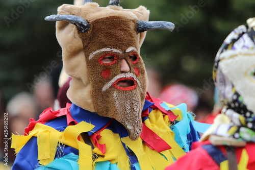 Zemen, Bulgaria - March 16, 2019: Masquerade festival Surva in Zemen, Bulgaria. People with mask called Kukeri dance and perform to scare the evil spirits.