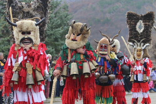 Fototapeta Zemen, Bulgaria - March 16, 2019: Masquerade festival Surva in Zemen, Bulgaria