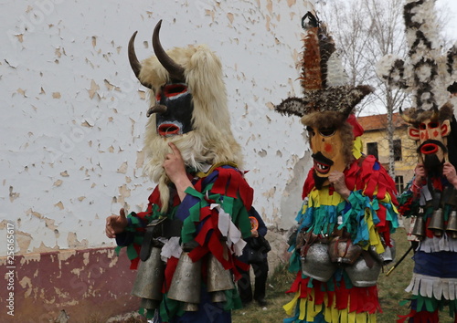 Foto Zemen, Bulgaria - March 16, 2019: Masquerade festival Surva in Zemen, Bulgaria