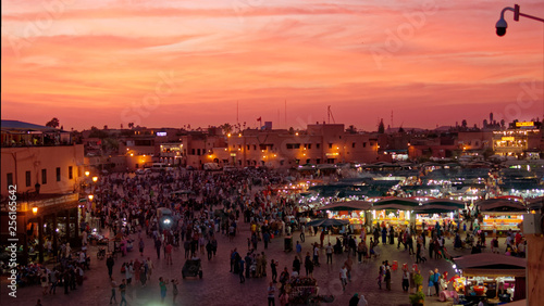 Jemaa el-Fnaa at sunset . The most famous plaza in Marrakesh. photo