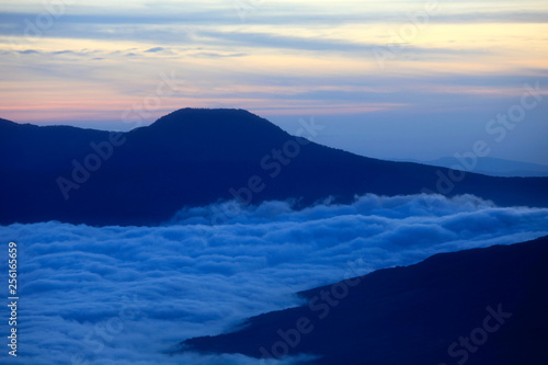 Clouds like sea in the mountains at sunset