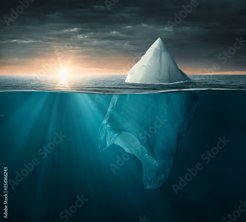 Obraz na płótnie Plastic bag in the ocean looking like an iceberg, with copy space
