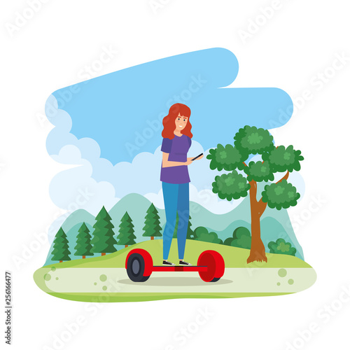 young woman in hoverboard electric in the field