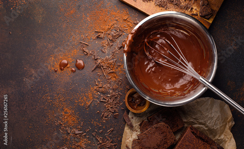 Tableau sur toile Homemade chocolate cake and cream with whisk