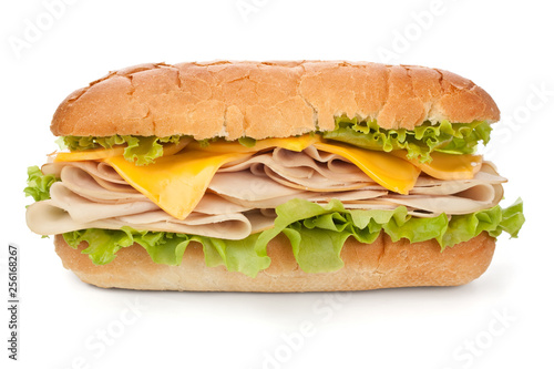 tasty turkey, cheese and lettuce sub sandwich isolated on white