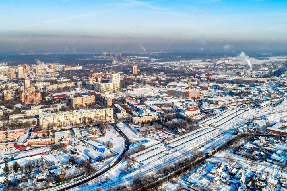 Aerial view of the modern city district. Winter, sunny day