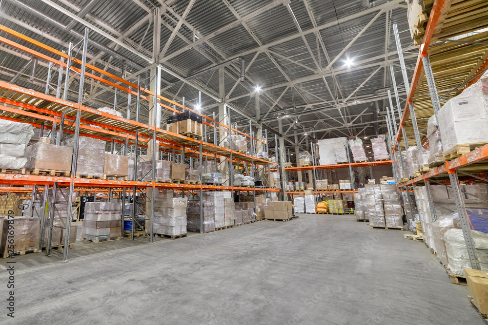 Long shelves with a variety of boxes and containers. Long shelves with a variety of boxes and containers.