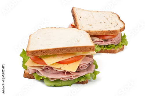 two big tasty sandwiches isolated on white