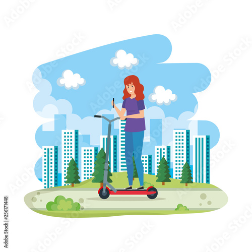 young woman in folding scooter on landscape