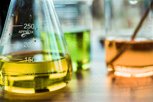 Lab glassware containing chemical liquid in laboratory