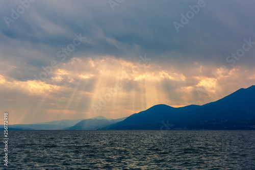 Landscape of lake and mountains and beautiful sun light