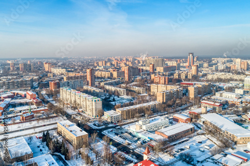 Aerial view of the modern city district. Winter, sunny day © nordroden