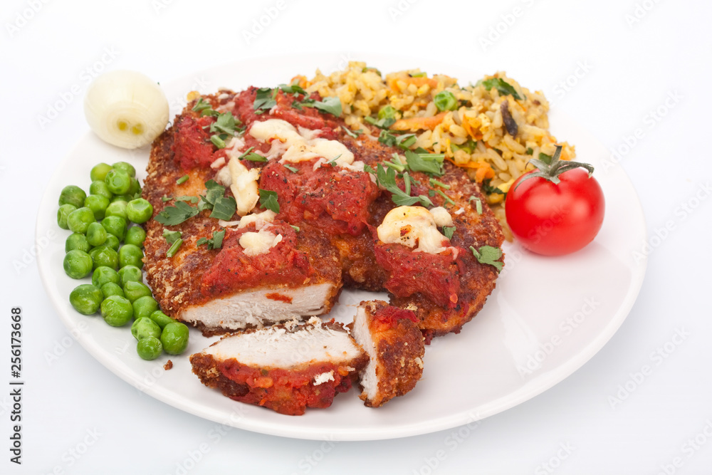 Chicken Parmesan with marinara sause on a plate on white background Chicken Parmesan with marinara sause on a plate on white background