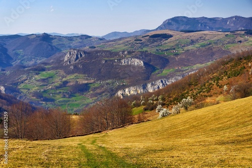 Stunning mountain scenery in spring in Europe with many green hills and trees