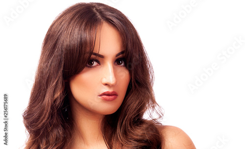 Pretty woman posing against white background