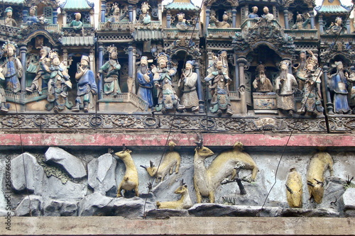 An interesting view of the traveler on sculptures of eastern religious art decorating the building of the Vietnamese capital.