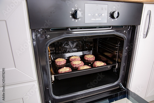 Fresh hot veal cutlet in fillo dough in the oven