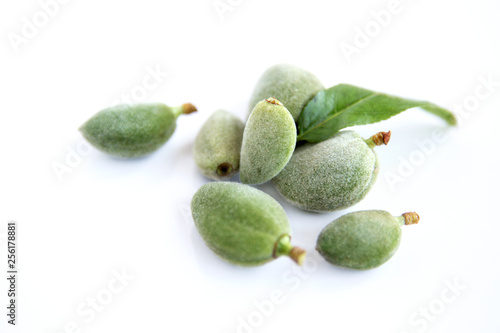 Fresh green almonds (cagla) isolated on white background