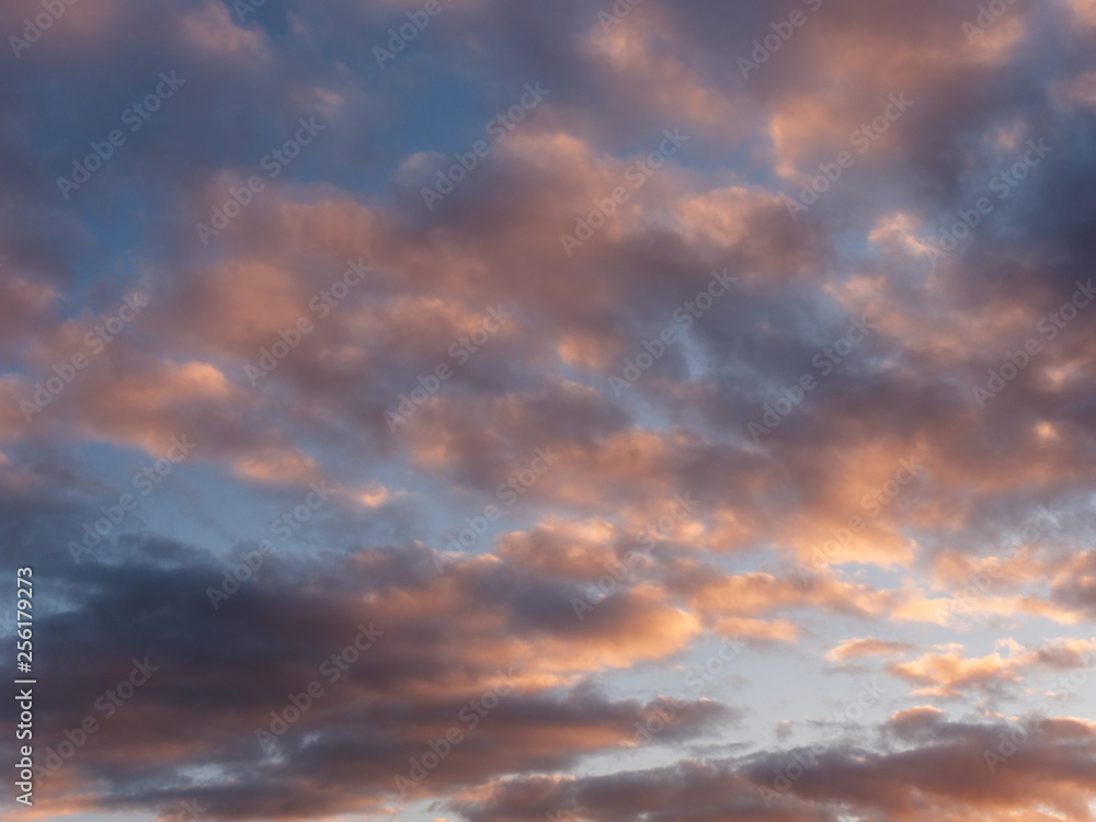colorful blue sky with clouds at sunset.