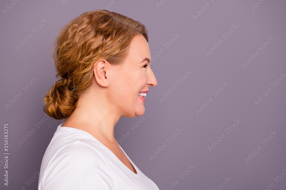 Close up side profile view photo beautiful amazing mature she her lady look empty space attentively listen comic story hairdo bun curious interested wear white t-shirt isolated grey background Close up side profile view photo beautiful amazing mature she her lady look empty space attentively listen comic story hairdo bun curious interested wear white t-shirt isolated grey background