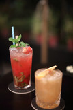 Red cocktail at bar