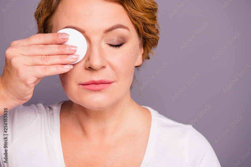 Close up photo beautiful amazing mature she her lady eyes closed shower bathroom take make-up down off check test watch skin condition use cotton pad wear white t-shirt isolated grey background Close up photo beautiful amazing mature she her lady eyes closed shower bathroom take make-up down off check test watch skin condition use cotton pad wear white t-shirt isolated grey background