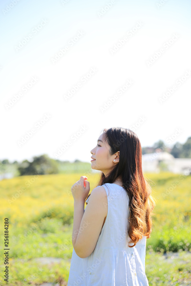 Portrait of Young Asian woman girl smile in flower garden Portrait of Young Asian woman girl smile in flower garden
