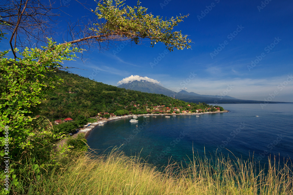 Amed Beach is located in North Bali. This beach has beautiful mountain views