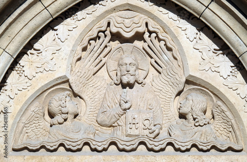 Relief of Jesus the Pantocrator from side portal of church of St. Matthias near the fisherman bastion in Budapest, Hungary