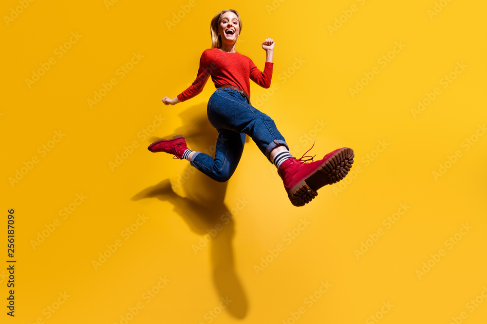 Low below angle full length body size view of nice attractive cheerful girl making step wearing vintage retro maroon burgundy footwear isolated over bright vivid shine orange background